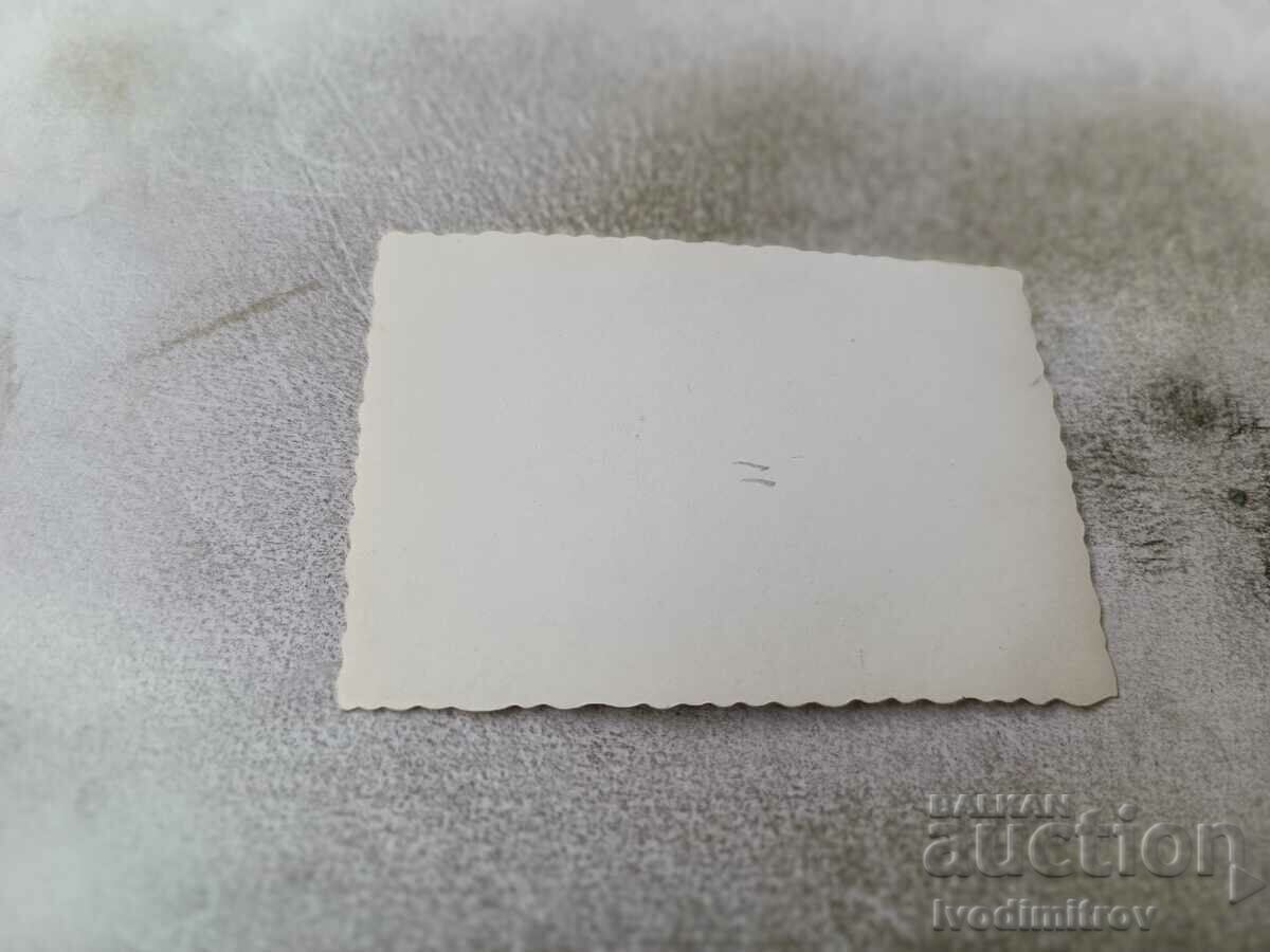 Photo Woman on a large stone on the seashore with price 0.75 BGN | € 0.38 Photo Woman on a large stone on the seashore with price 0.75 BGN | € 0.38