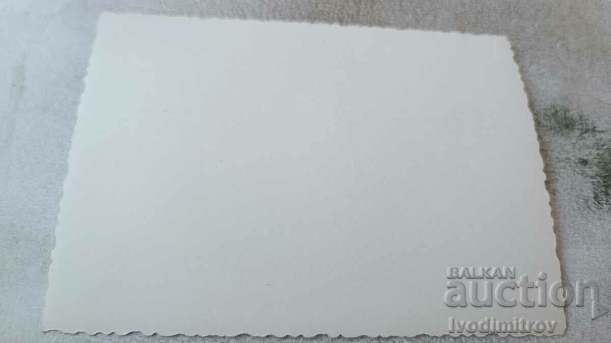 Φωτογραφία ενός άνδρα και ενός αγοριού στην παραλία με τιμή 2.35 BGN | € 1.20