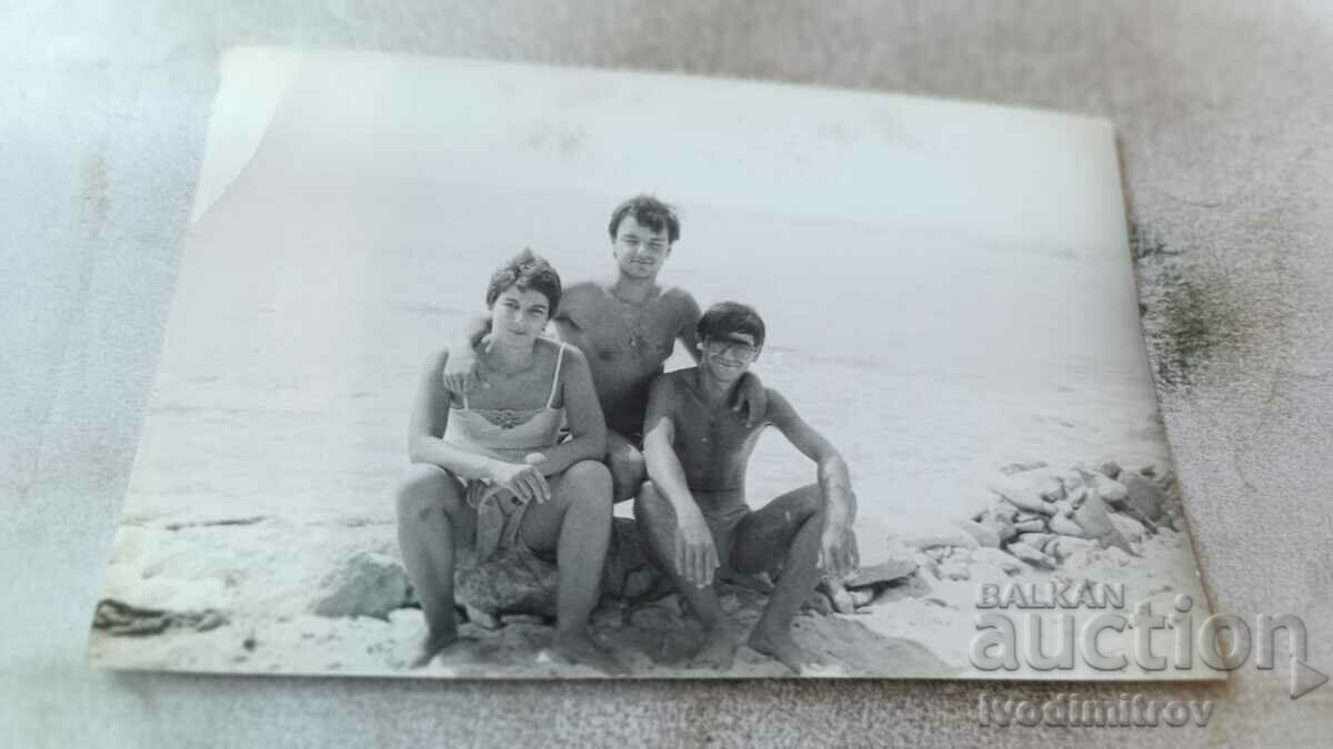 Photo Ravda Two young men and a young girl on the beach 1986