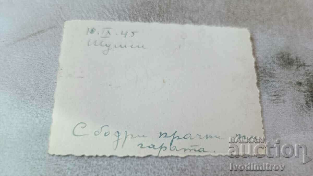 Photo Shumen A man and a woman briskly walking towards the station 1945 with price 2.45 BGN | € 1.25 Photo Shumen A man and a woman briskly walking towards the station 1945 with price 2.45 BGN | € 1.25