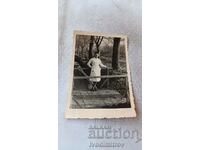 Photo Skopje Woman in a white apron on a wooden bridge 1943