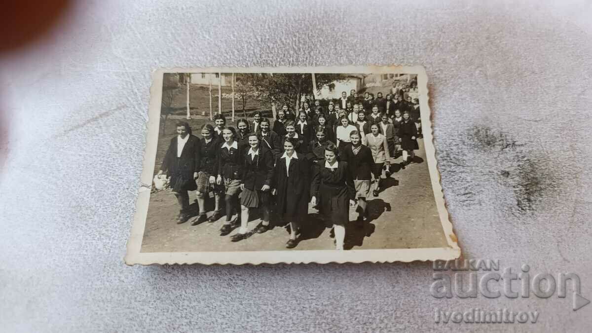 Photo Schoolgirls on a street procession