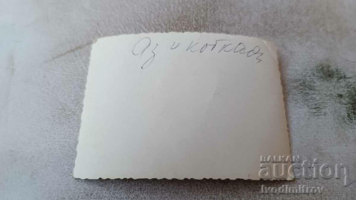 Photo Woman holding cat on stairs with price 0.65 BGN | € 0.33 Photo Woman holding cat on stairs with price 0.65 BGN | € 0.33