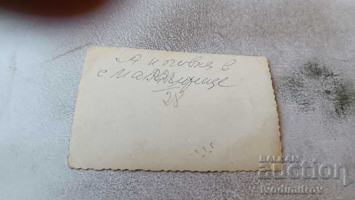 Photo Panichishte A man and young women in front of a paratka with price 0.85 BGN | € 0.43 Photo Panichishte A man and young women in front of a paratka with price 0.85 BGN | € 0.43