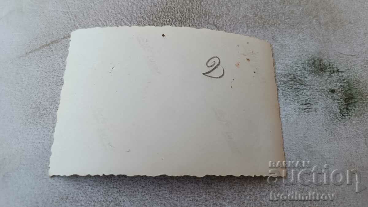 Photo Schoolgirls with their teacher in the school yard with price 0.85 BGN | € 0.43 Photo Schoolgirls with their teacher in the school yard with price 0.85 BGN | € 0.43