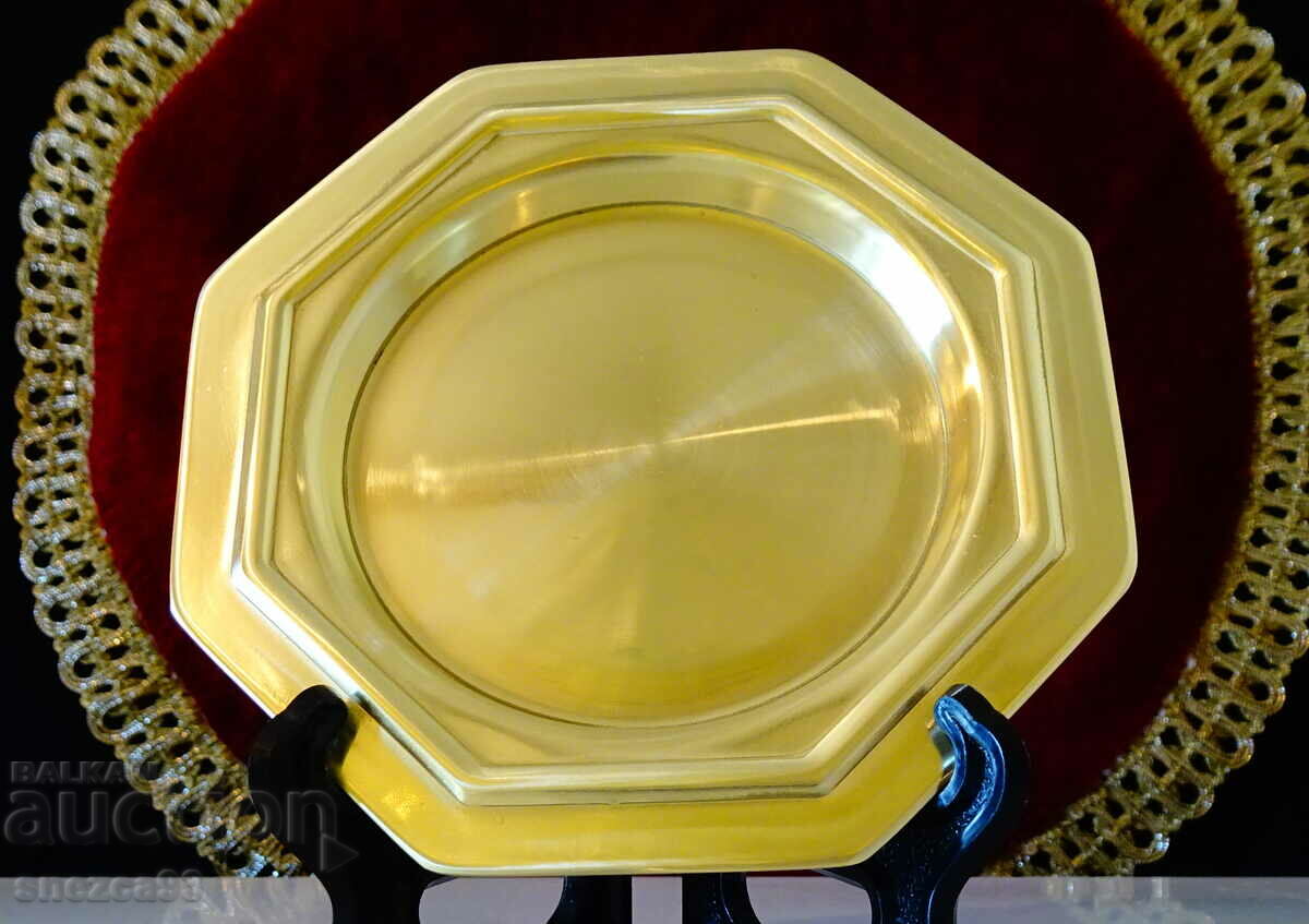 Brass plate, relief, octagon.