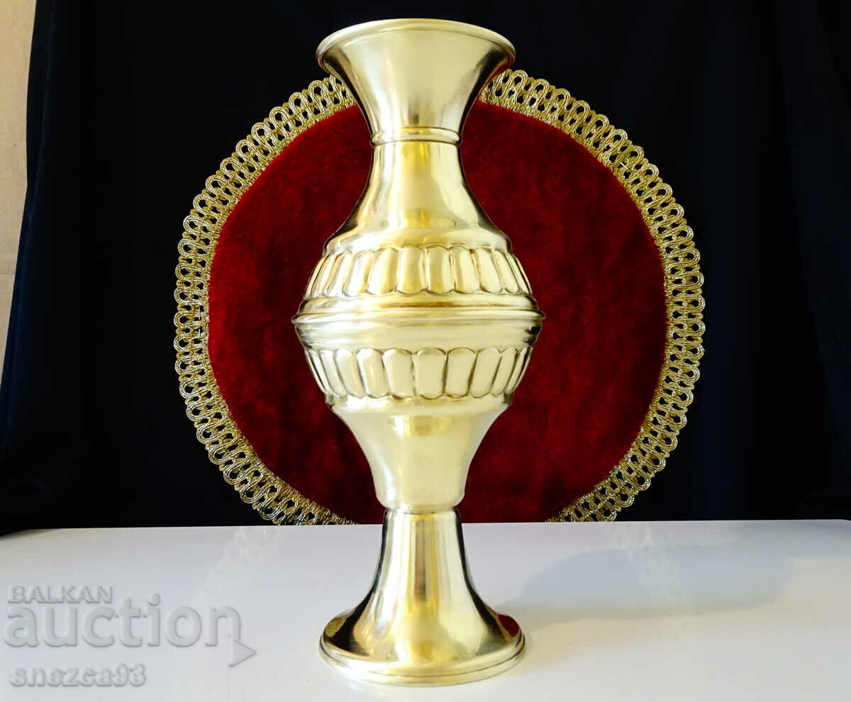Relief vase, carafe made of brass.