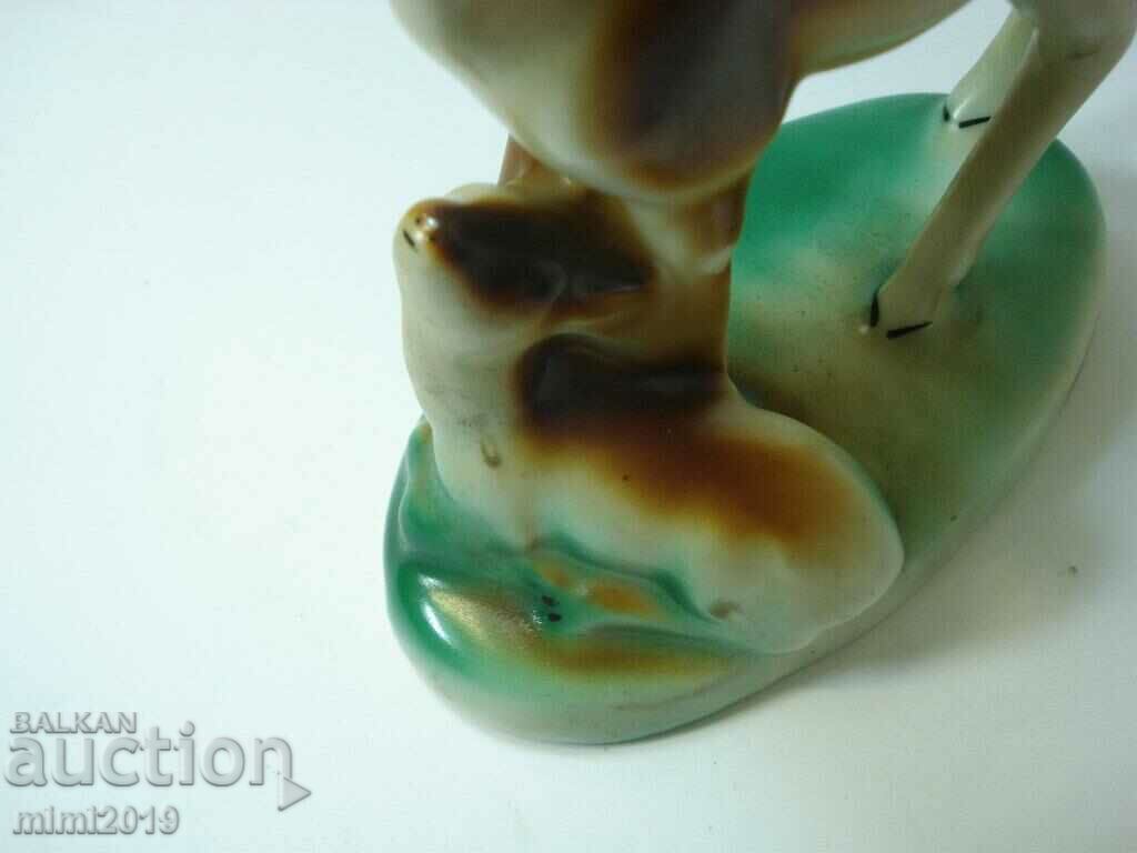 Auction  Old Isis - Porcelain Figure