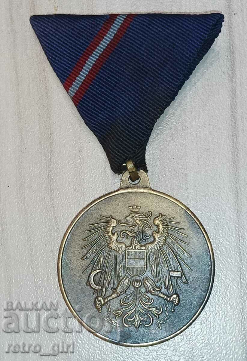 Medalia Serviciului Militar austriac.