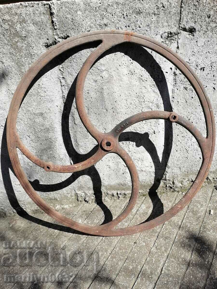 Wheel cast relief cast iron from pressed wrought iron casting