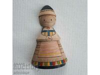 Old wooden doll