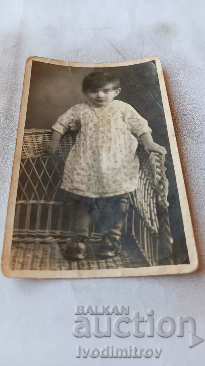 Photo Sofia Little girl in a wicker chair 1936