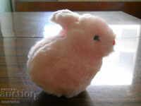 old plush children's toy with mechanism - bunny