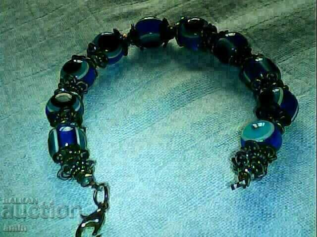 old natural blue glass bracelet on a blue eye old natural blue glass bracelet on a blue eye