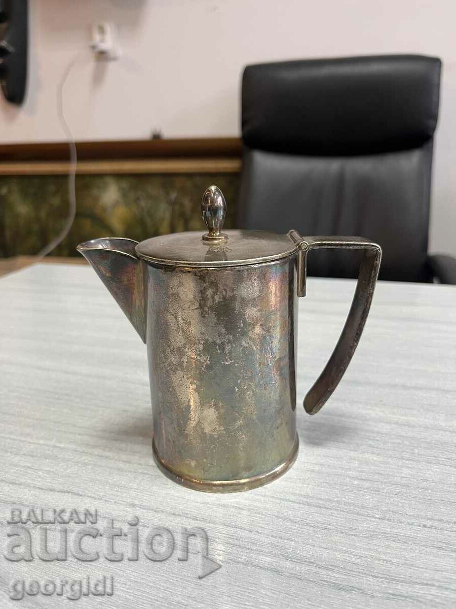 English silver plated milk jug. #3641