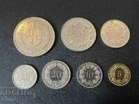 O mulțime de monede din Elveția
