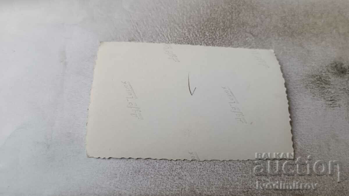 Photo A man and a dog in the yard of an old country house with price 1.85 BGN | € 0.95 Photo A man and a dog in the yard of an old country house with price 1.85 BGN | € 0.95