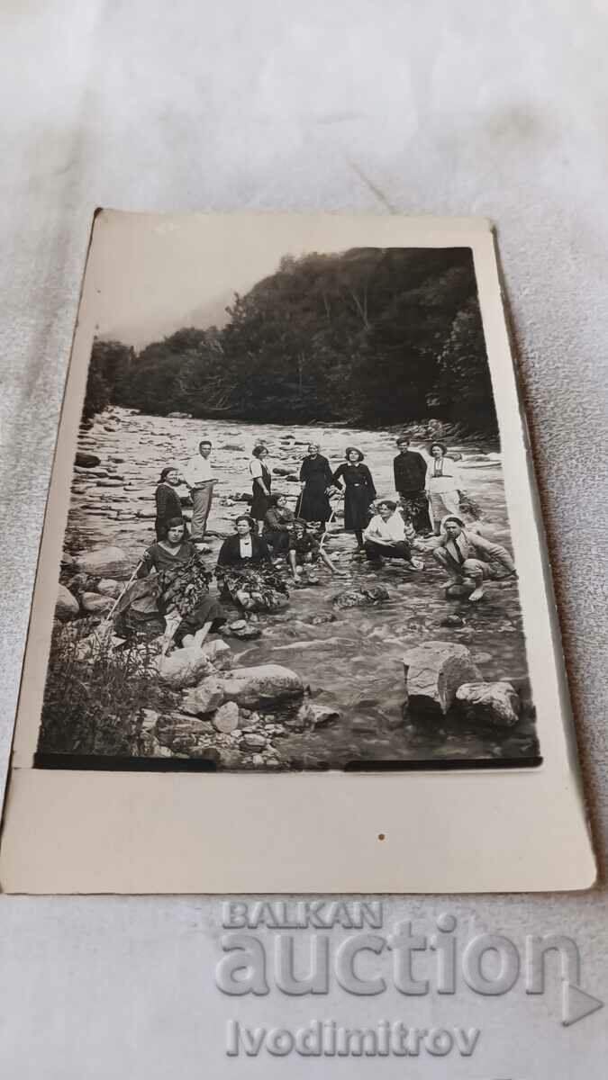 Photo Young men and women in the bed of the Rilska River, 1933