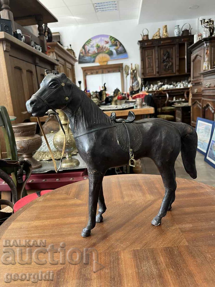 Old leather figure of a horse. #3650