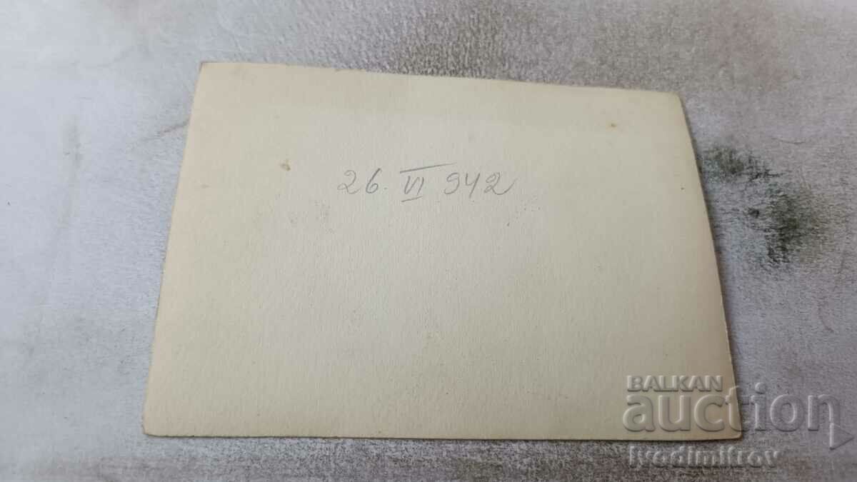 Photo Man woman and young girl on a wooden bench 1942 with price 0.95 BGN | € 0.49