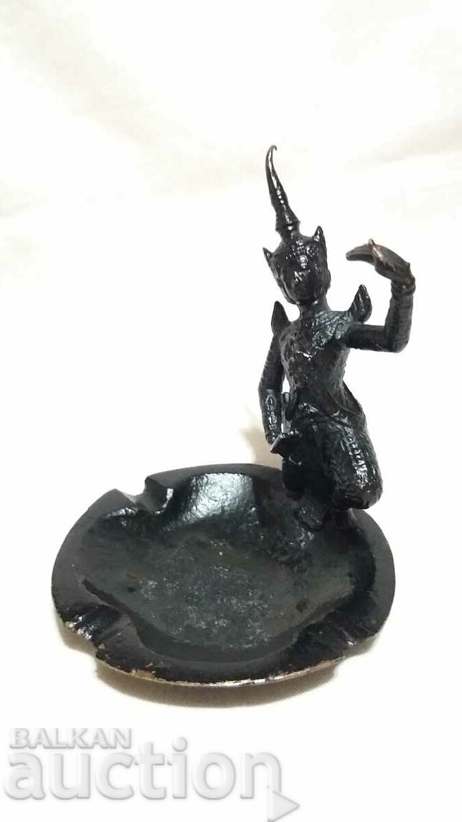 Old bronze ashtray with figure