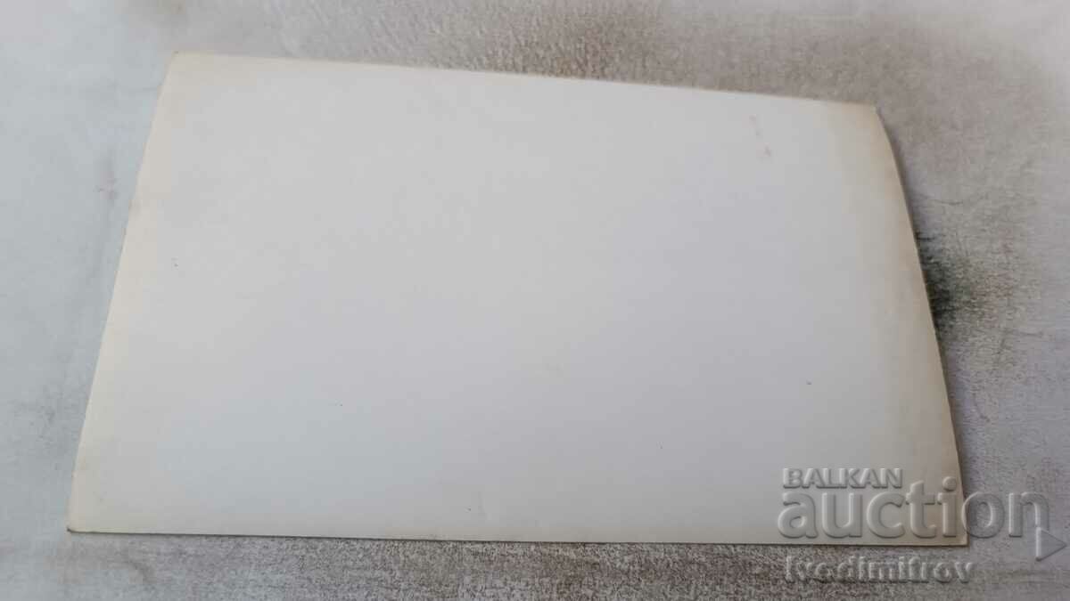 Picture Men and women having a drink at a table with price 0.85 BGN | € 0.43