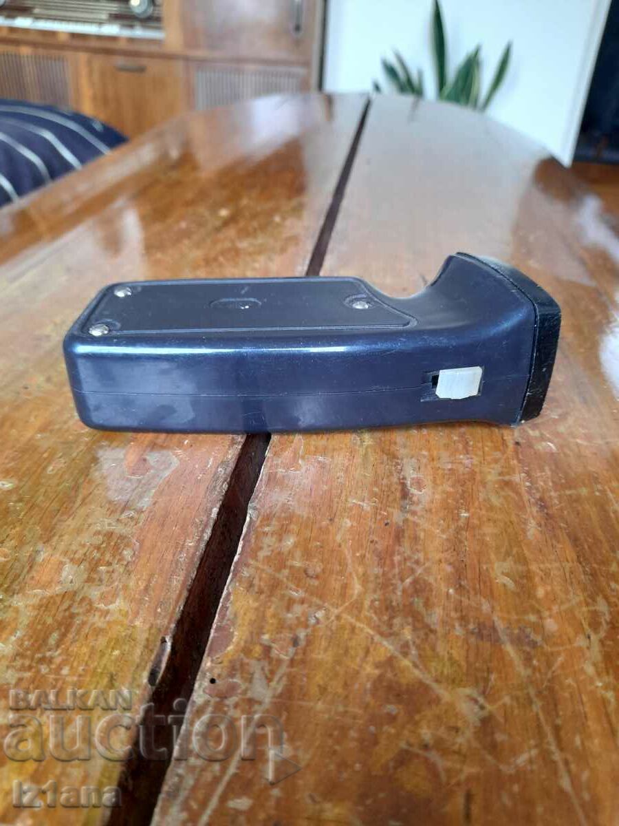 Auction  Old torch with dynamo