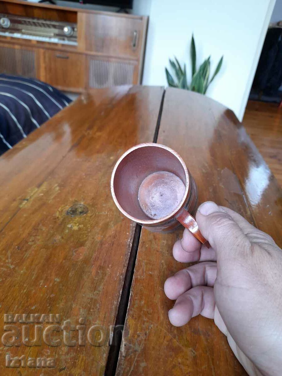 Delivery of Old wooden cup, mug