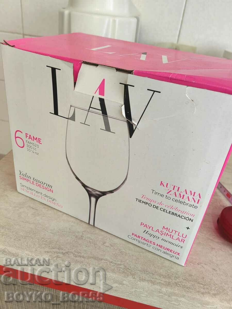 Auction Set of Six Brand New Foreign Glasses on a Chair Auction Set of Six Brand New Foreign Glasses on a Chair