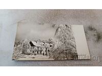 Postcard Mountain hut in winter