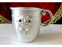 Pewter cup with crown, royal coat of arms.
