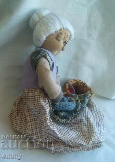Delivery of Old doll - grandmother with knitting, Germany Delivery of Old doll - grandmother with knitting, Germany