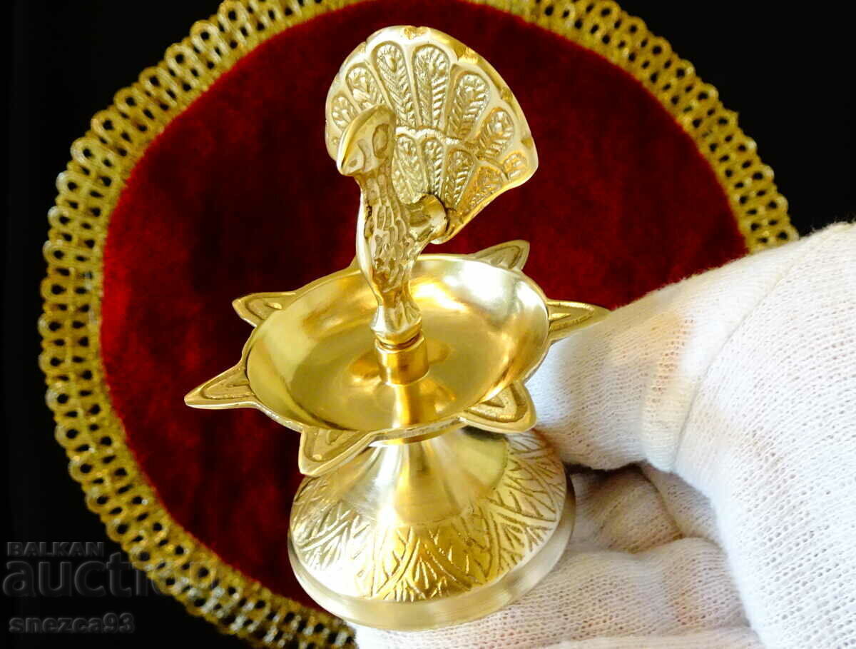 Bronze candlestick with Peacock. with price 19.00 BGN | € 9.71
