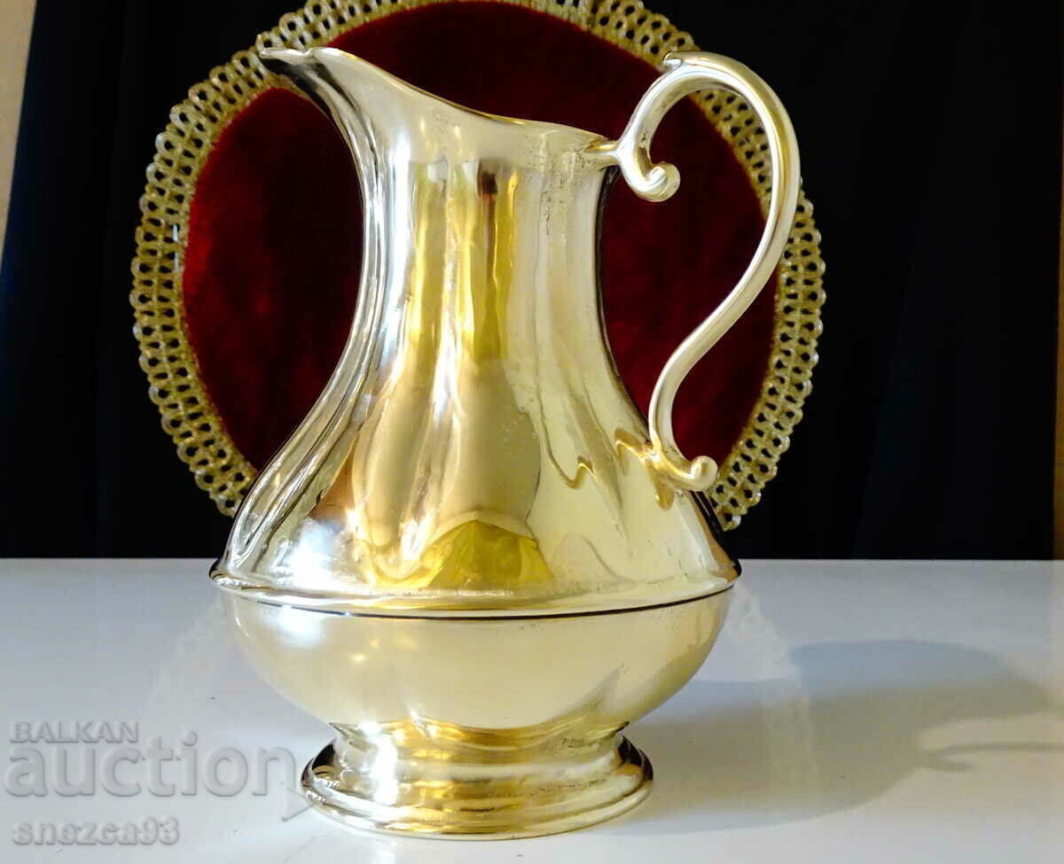 Delivery of Massive bronze jug for wine, relief.