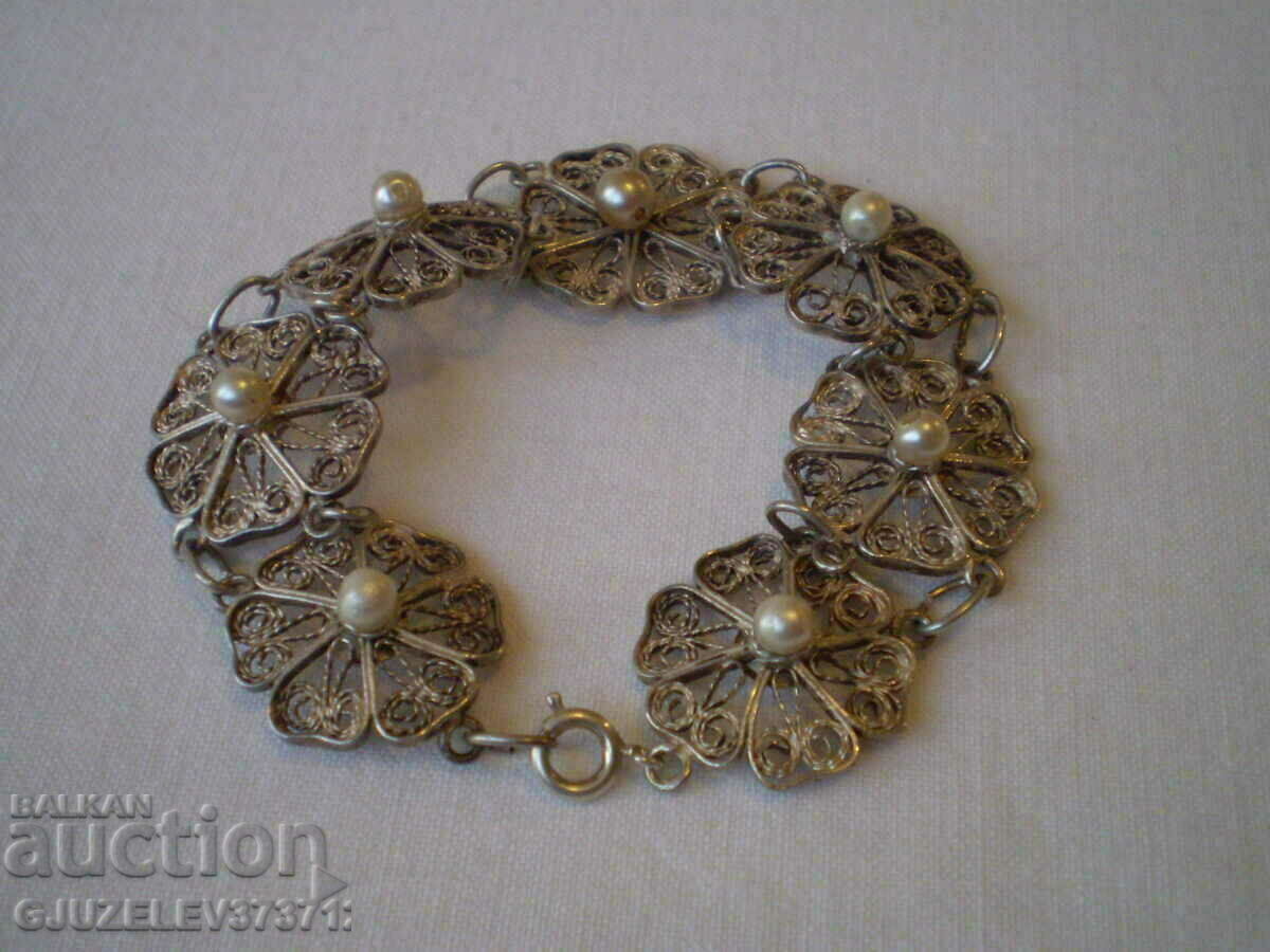Delivery of women's filigree bracelet with pearls Delivery of women's filigree bracelet with pearls