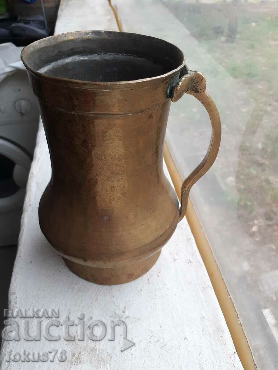 Delivery of Old bronze mug, cup, jug Delivery of Old bronze mug, cup, jug