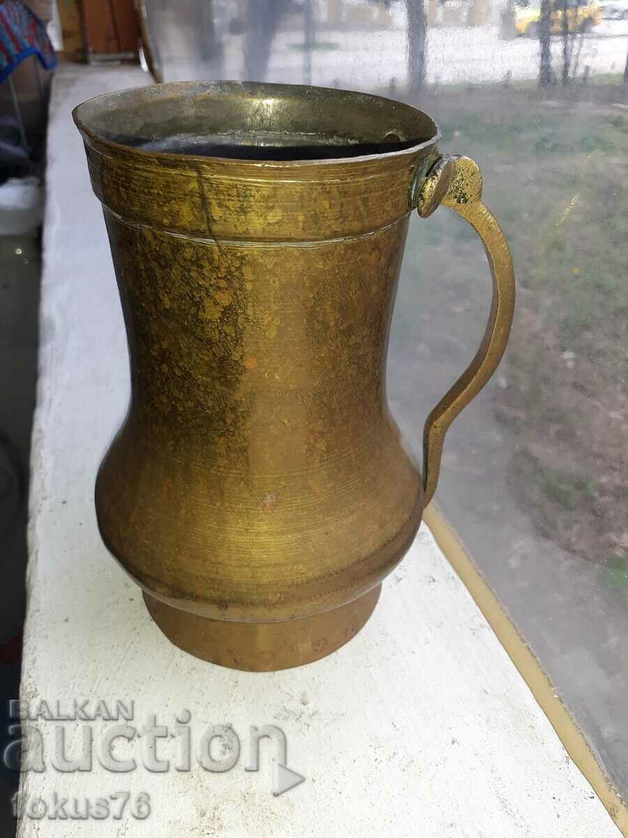 Old bronze mug, cup, jug