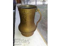 Old bronze mug, cup, jug