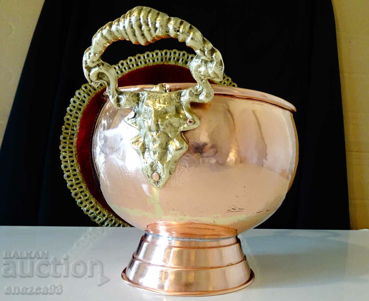 Copper vessel with bronze handles, lion heads. Copper vessel with bronze handles, lion heads.