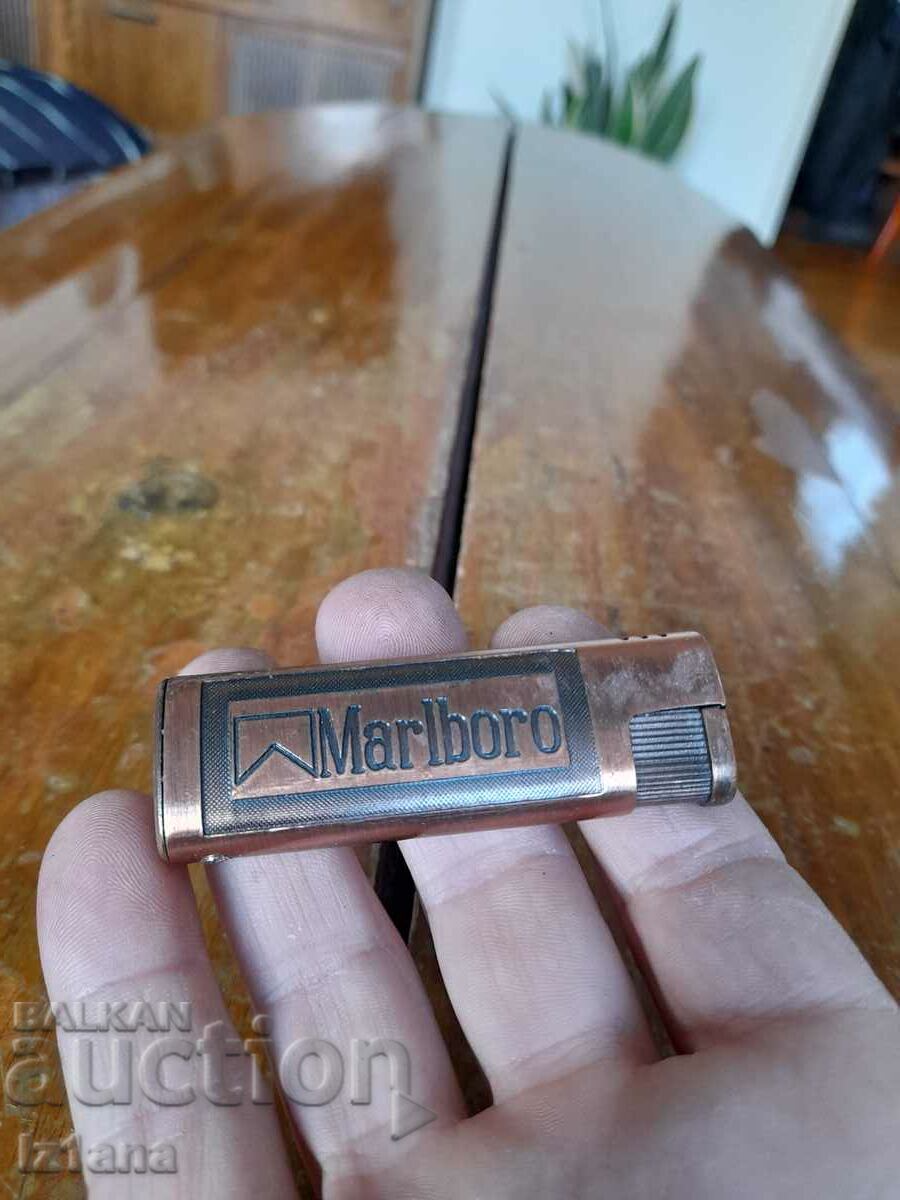 An old Marlboro lighter with price 22.00 BGN | € 11.25 An old Marlboro lighter with price 22.00 BGN | € 11.25