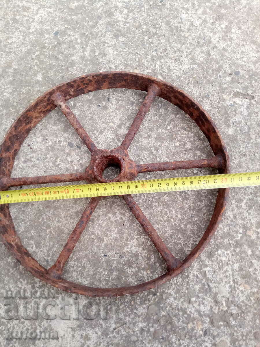 An old iron wheel with price 19.99 BGN | € 10.22 An old iron wheel with price 19.99 BGN | € 10.22