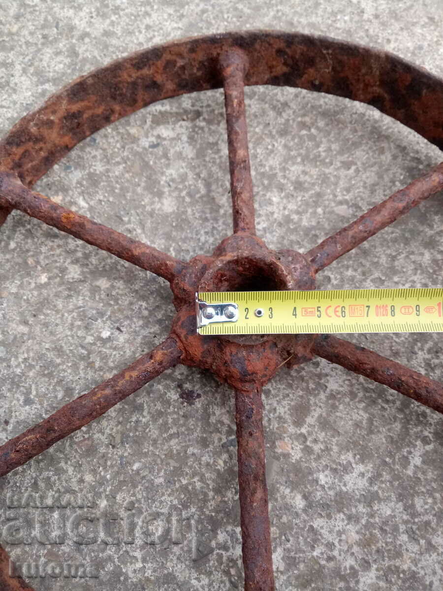 Delivery of An old iron wheel Delivery of An old iron wheel