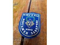 Veche emblemă Muntele Zavarchik, KZU