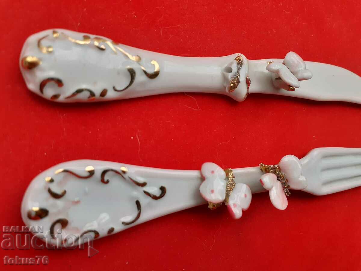 Auction Capodimonte porcelain fork and knife set with gilding Auction Capodimonte porcelain fork and knife set with gilding