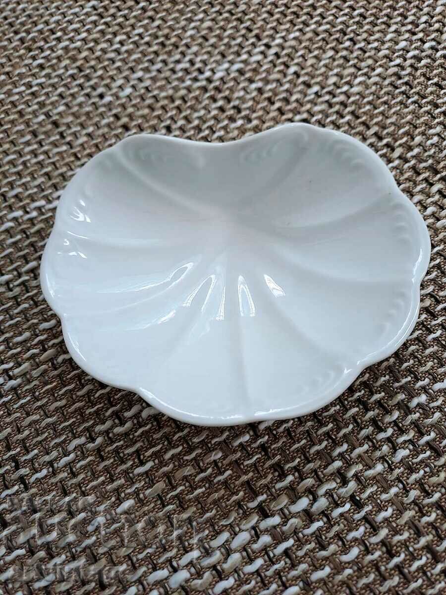 Porcelain clam saucer and two saucers