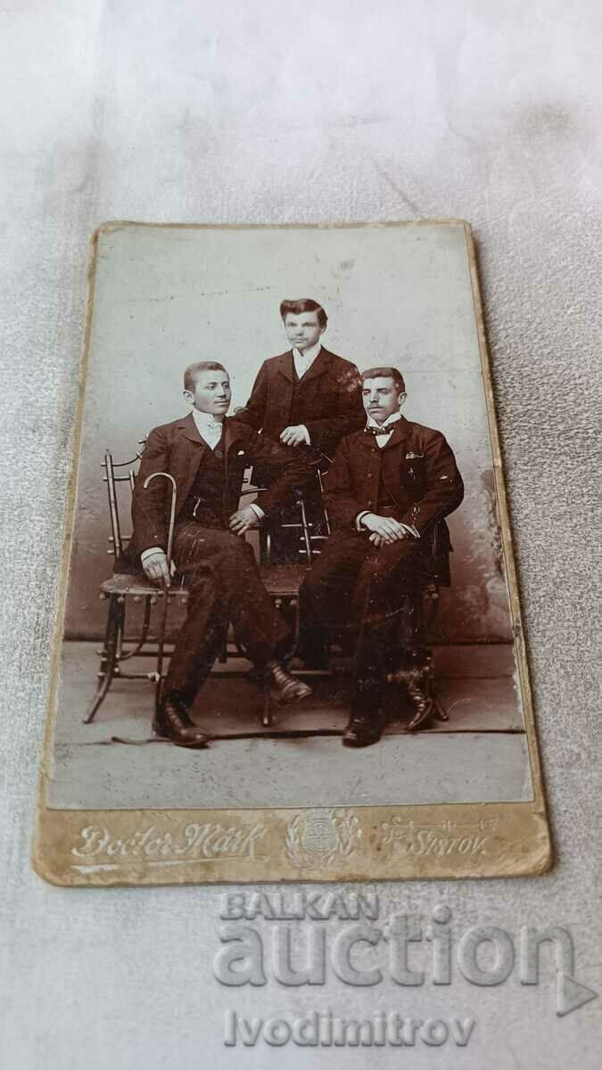 Photo Three young men Cardboard