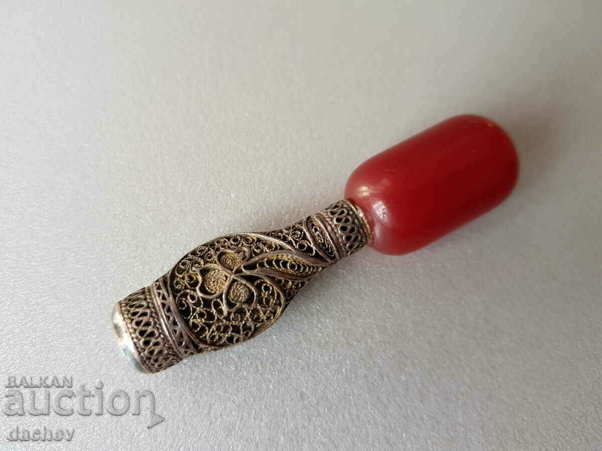 Auction  Renaissance cigarette silver filigree and red amber Damar