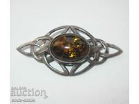 Old women's silver brooch with amber handmade
