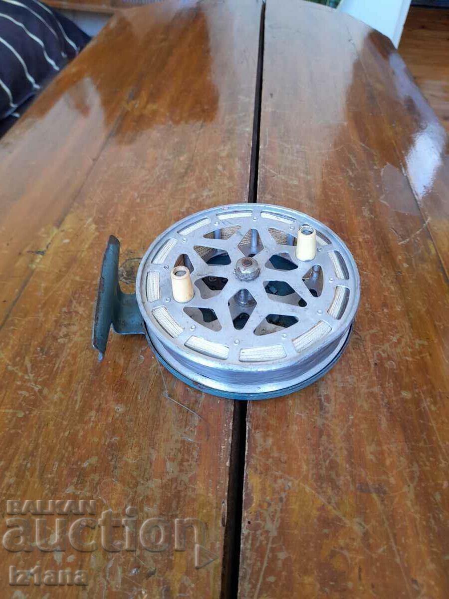 Old fishing reel Old fishing reel