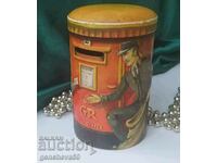 Old tin box piggy bank/England